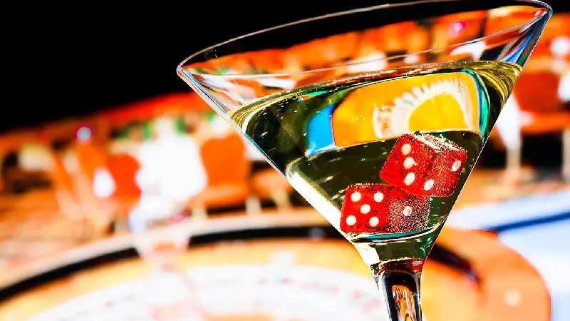 Wine glass with dice at a casino