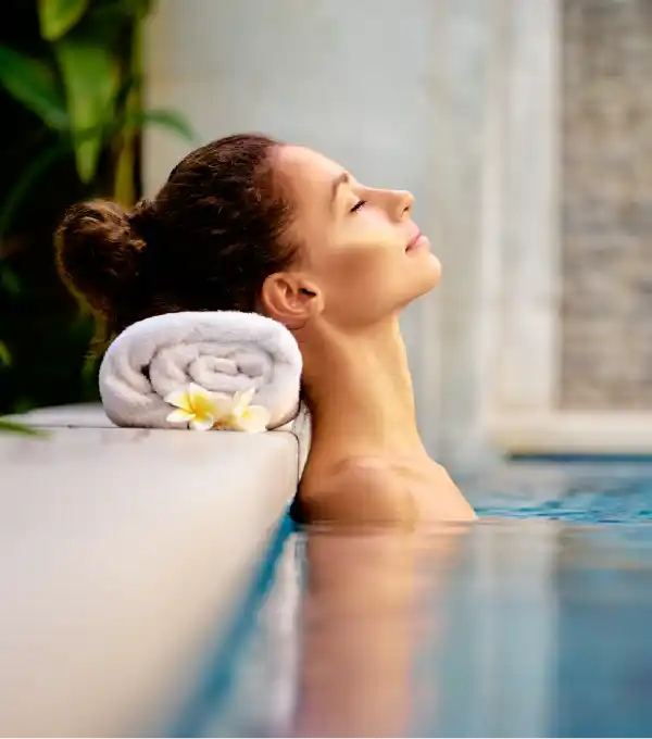 Woman relaxing in the sauna at The Greenbrier